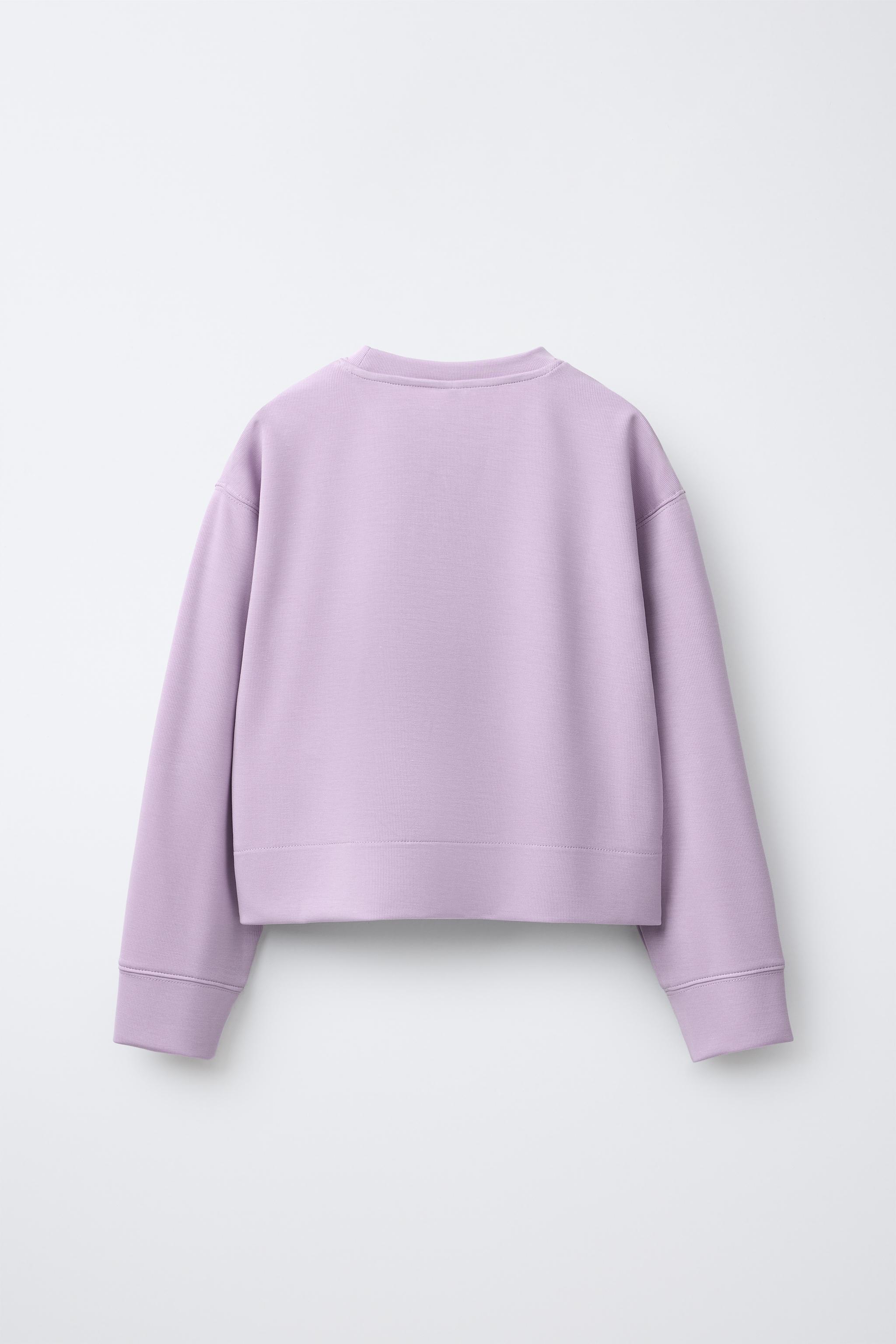 SWEAT AVEC MODAL ET INSCRIPTION